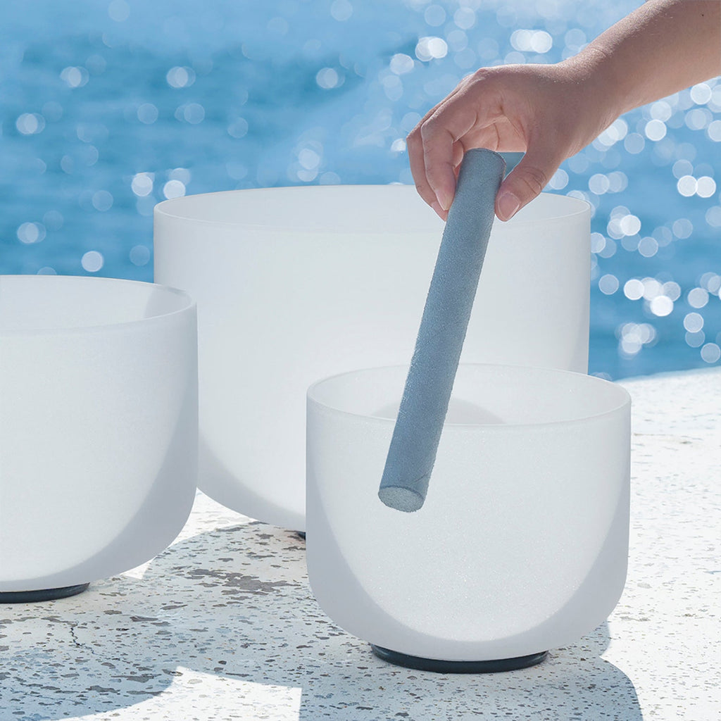 Set of three frosted white singing bowls