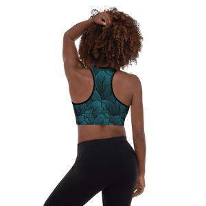 Tropical leaves sports bra - Back of woman wearing amazing blue green tropical leaves sports bra for surf or yoga
