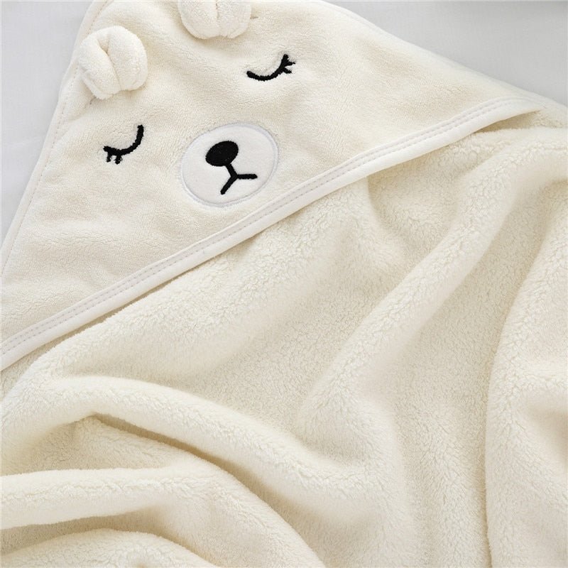 Close-up of soft white bear hooded baby bath towel