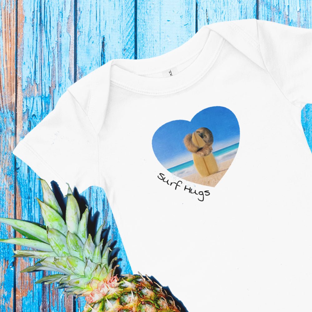 Surf hugs sloth baby clothing in bodysuit style for the beach