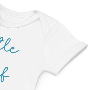 Detail of white organic baby bodysuit